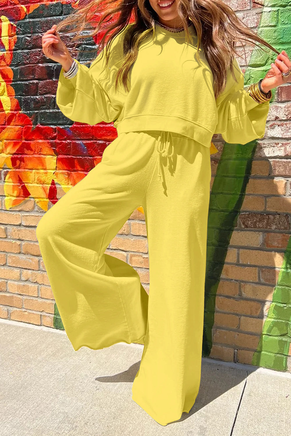 Yellow cream drop shoulder crop pullover with drawstring wide leg pants set in soft polyester cotton blend