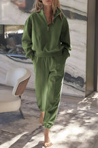 Vineyard green half zip pullover and joggers set in relaxed fit with elastic waist, perfect for athleisure and comfort.