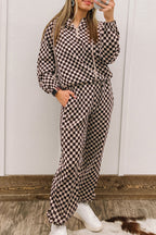 Black athleisure checkered pullover and jogger pants set with relaxed fit and tapered silhouette