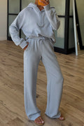Light blue half zip thumbhole sleeve hoodie and matching active pants two-piece outfit