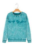Sea green mineral wash loose sweatshirt with "saved by grace" embroidery and relaxed fit