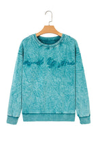 Sea green mineral wash loose sweatshirt with "saved by grace" embroidery and relaxed fit