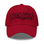 Red Buckhaus Print Dad hat with black embroidered logo and adjustable strap