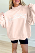 Light pink oversize sweatshirt with blessed embroidery and mock neck design.