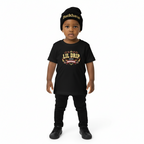 toddler wearing black Lil Drip Buckhaus short sleeve tee and matching beanie with colorful graphic print