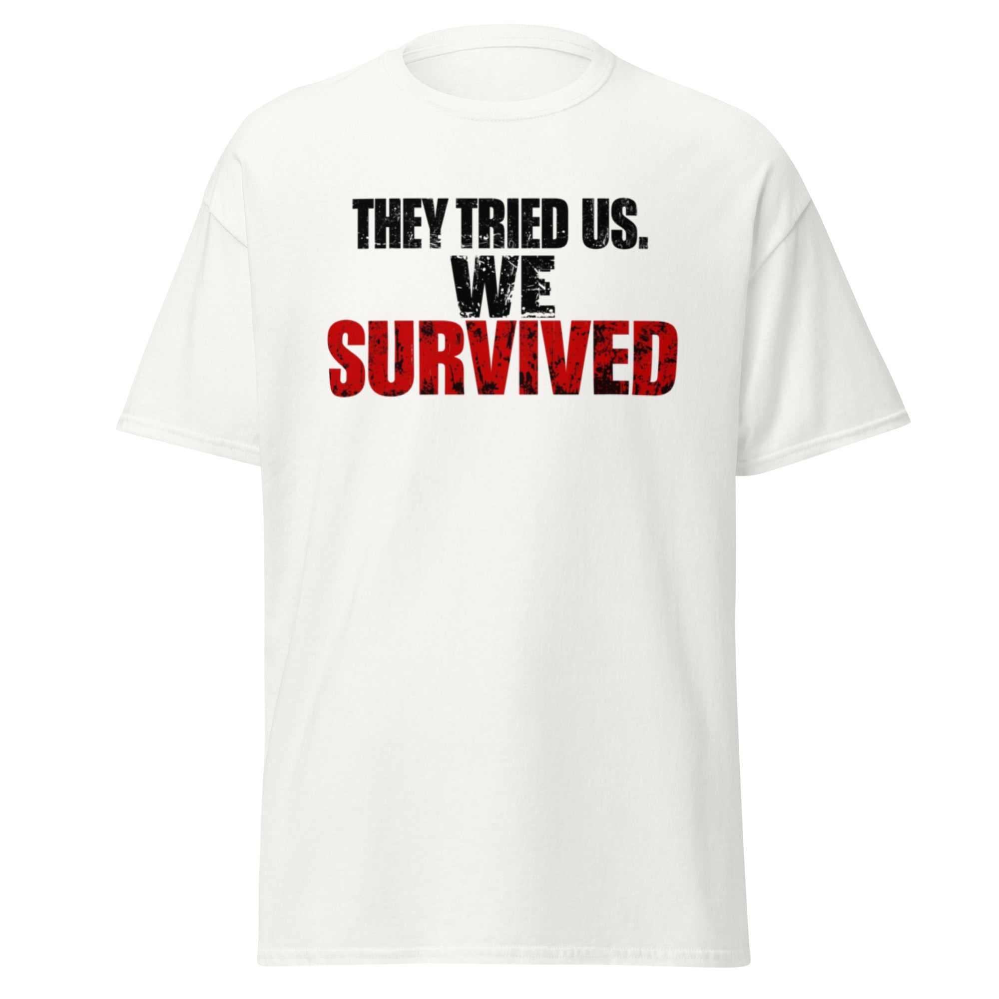 White unisex classic tee with "They Tried Us. We Survived" printed in bold black and red text